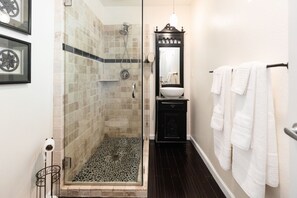 Combined shower/bathtub, hair dryer, towels, soap