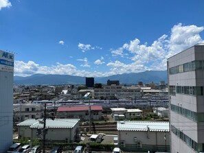 Located in an urban setting, this high-rise building offers stunning city views and easy access to public transportation.