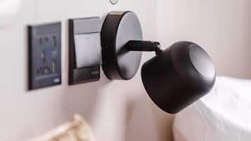 A modern door lock system with a keyhole and a card reader.