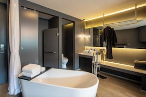 Deluxe Bathtub Seaview | Bathroom | Shower, hydromassage showerhead, hair dryer, bathrobes