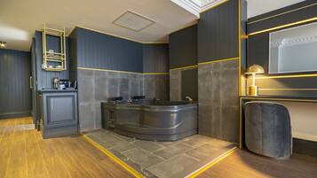 Suite With Seaview And Jacuzzi | Bathroom | Shower, rainfall showerhead, designer toiletries, hair dryer