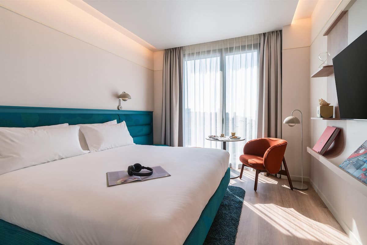 Deluxe Double Room | In-room safe, desk, laptop workspace, blackout drapes