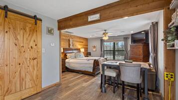 1 bedroom, desk, iron/ironing board, travel crib