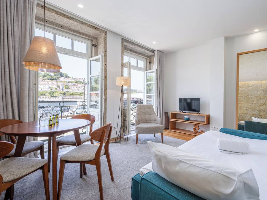 Family Apartment | Living area | 32-inch Smart TV with cable channels, TV