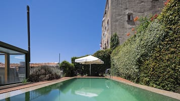 Outdoor pool, open 10:00 AM to 7:00 PM, pool umbrellas, sun loungers