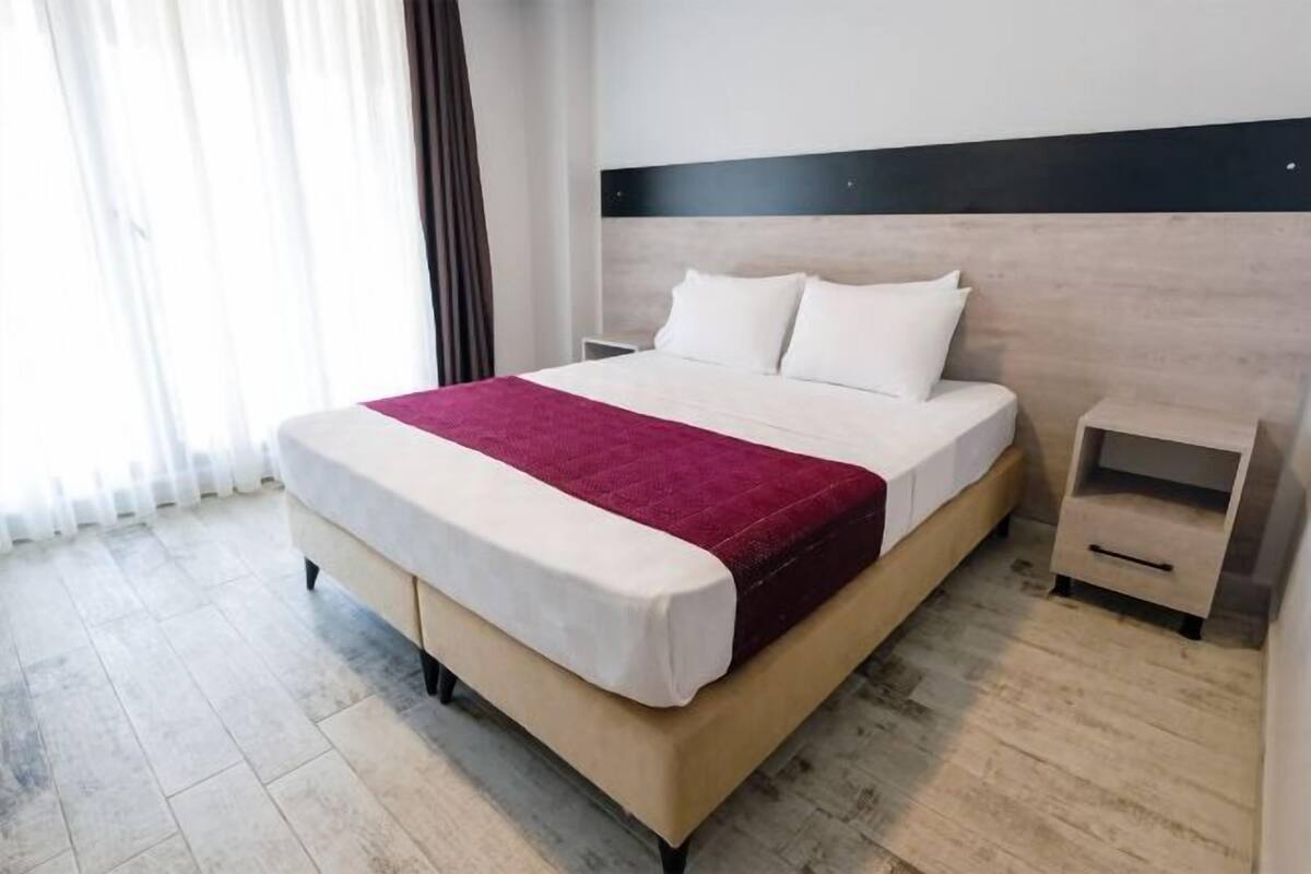 Egyptian cotton sheets, premium bedding, minibar, in-room safe