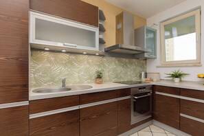 Apartment, 1 Bedroom, Balcony | Private kitchen | Microwave, coffee/tea maker, cookware/dishes/utensils, freezer - Pejzażowa Apartment Metro Wilanowska (Warsaw)