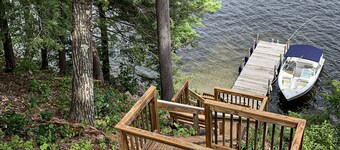 Two updated lakefront homes - dock with boat slip, game room, & screened porch