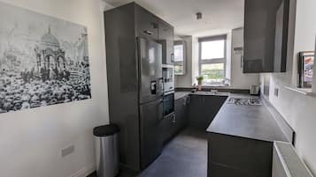 Apartment | Private kitchen | Fridge, microwave, oven, stovetop