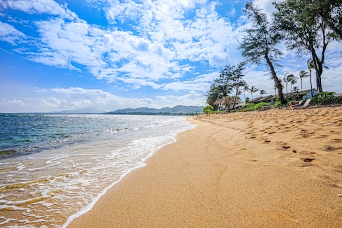 Ground-floor resort condo with ocean & sunrise views - beachside pool & hot tub