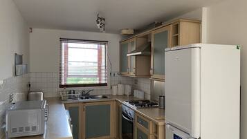 Apartment | Private kitchen | Fridge, microwave, oven, stovetop