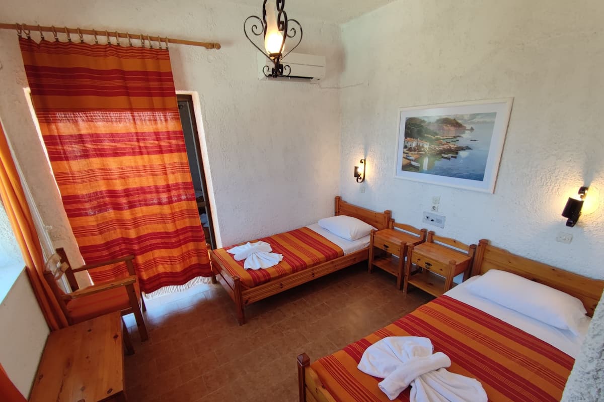 Chambre classique avec lits jumeaux, vue sur la mer | Lit avec matelas Select Comfort, bureau, systĂšme dâinsonorisation