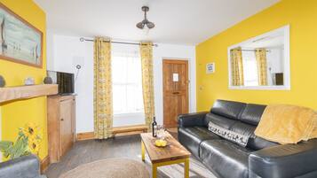 テレビ、暖炉、書庫、ミュージックライブラリ