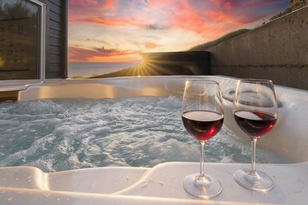 Ocean and sunset views from the hot tub