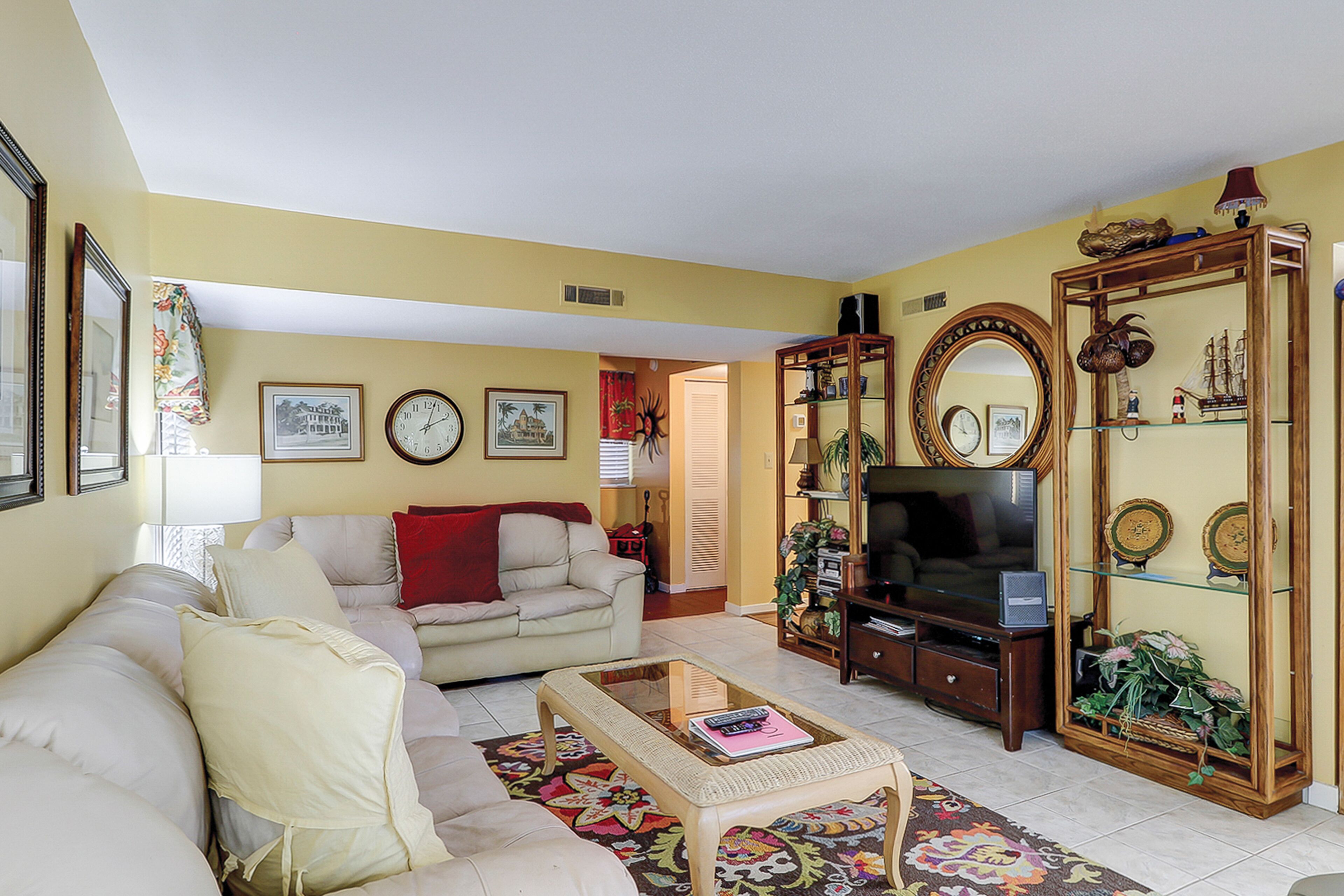 Dog-friendly condo with pool, tennis, patio, balcony, & washer/dryer