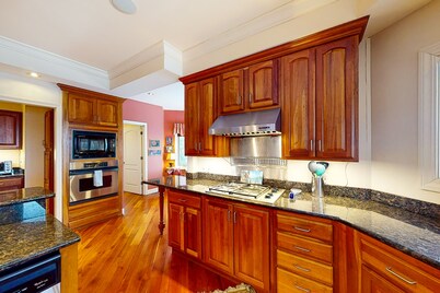 Lakefront home with deck, private beach, firepit, WiFi, & W/D - quiet location