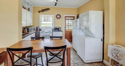 Beachfront dog-friendly home with beach access, ocean views, deck, and W/D
