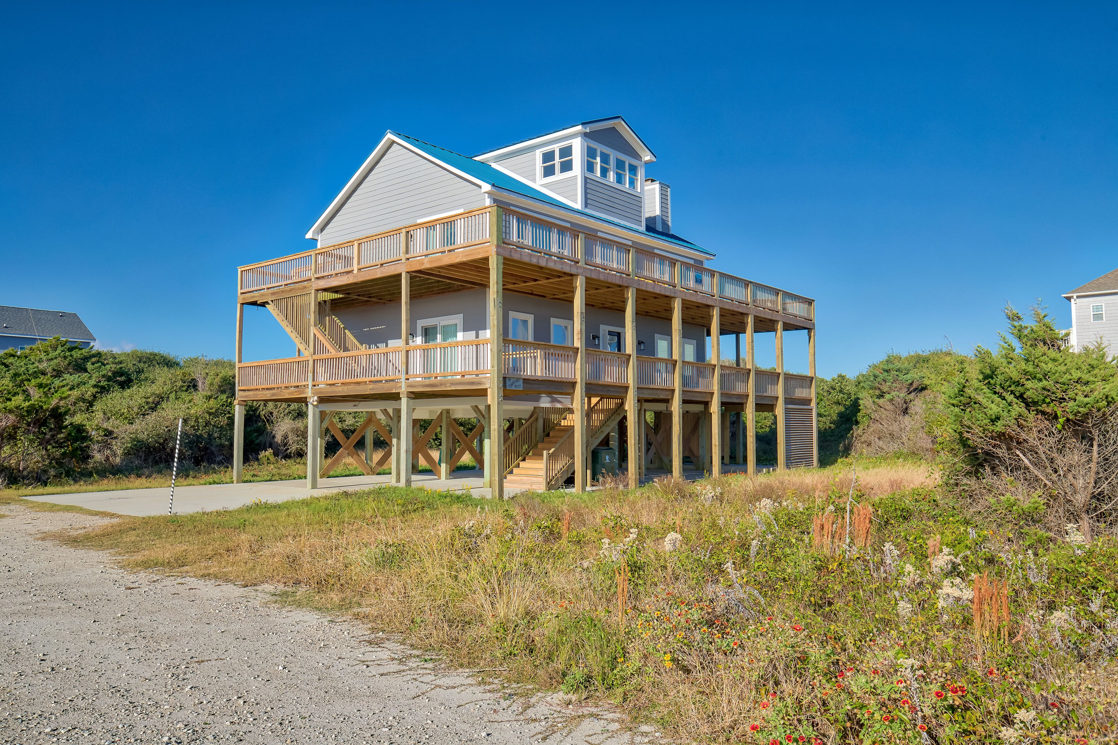 Ocean-view beach home - private hot tub, central AC & fireplace - dog-friendly