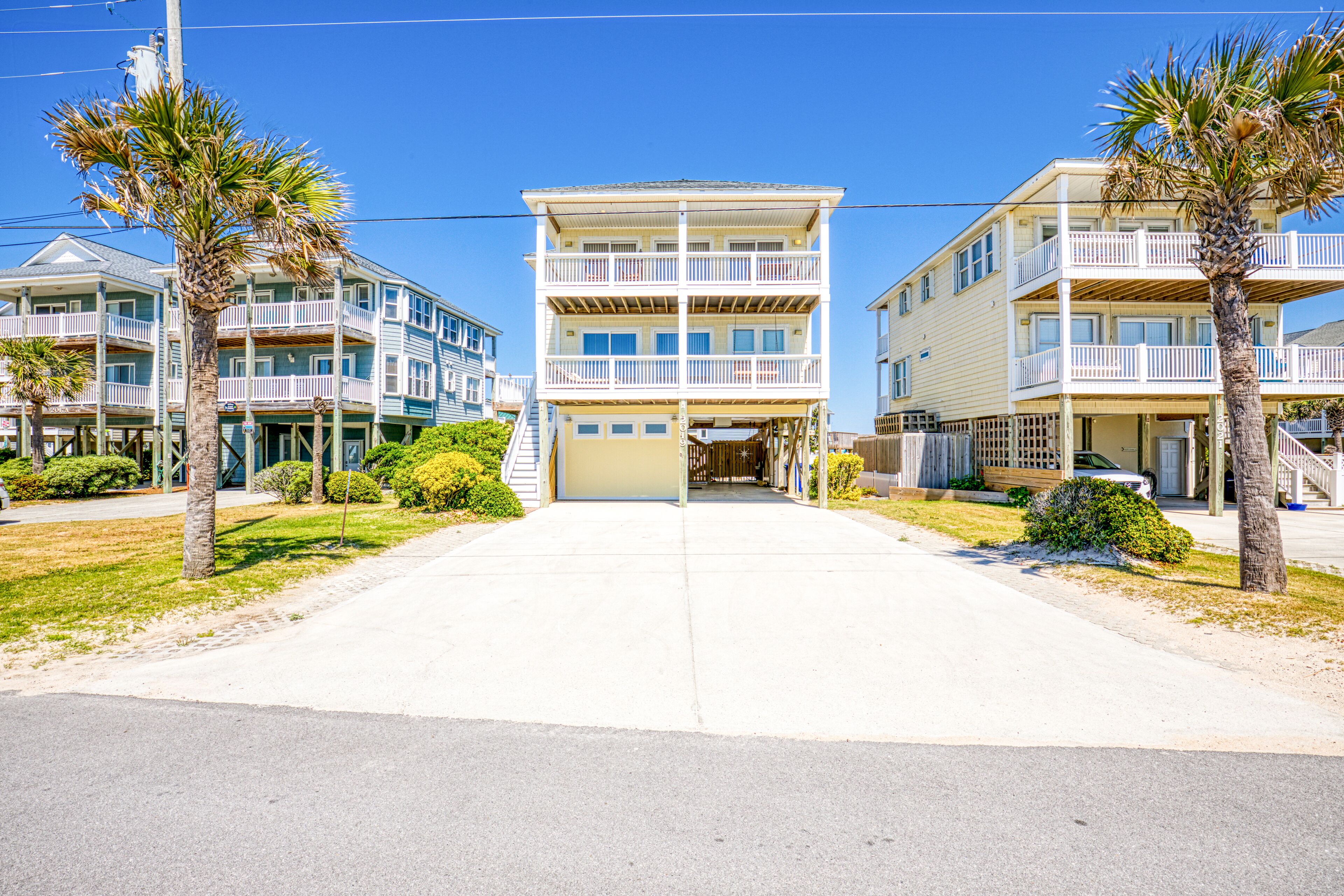 Multi-level beachfront home with private heated pool, elevator, beach access, AC