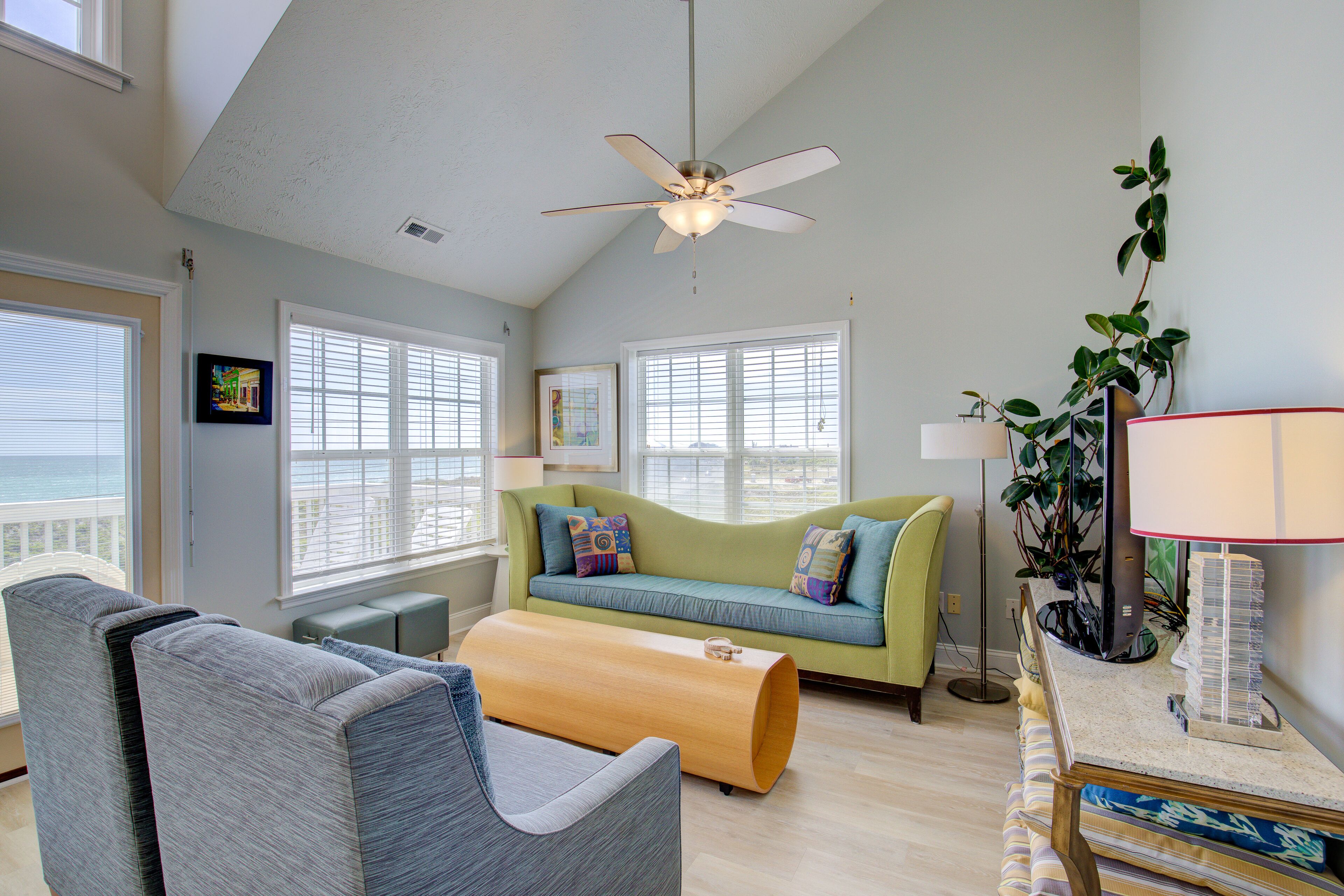 Beach-view multi-level duplex with outdoor shower, decks, ground-level patio