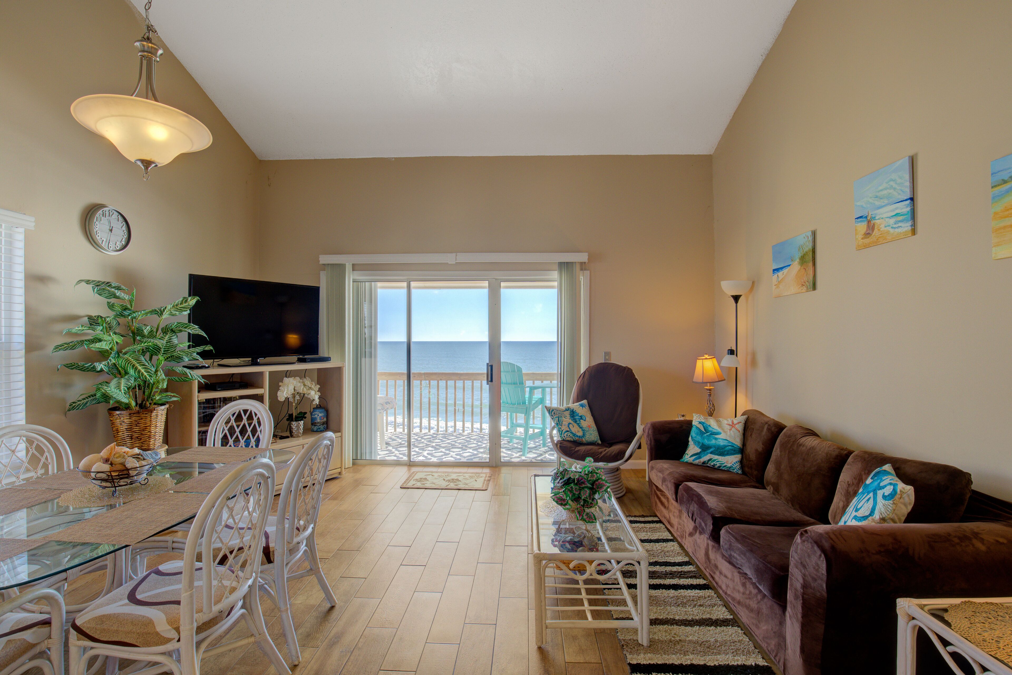 Oceanfront condo with beach views, balcony, community pool & W/D, central AC