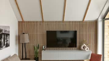 Premium Apartment, 2 Bedrooms, Fireplace, Mountain View | Living area | 65-inch flat-screen TV with digital channels, TV, fireplace