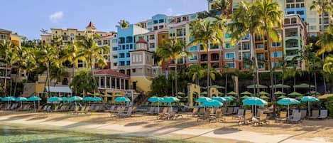 On the beach, sun loungers, beach towels