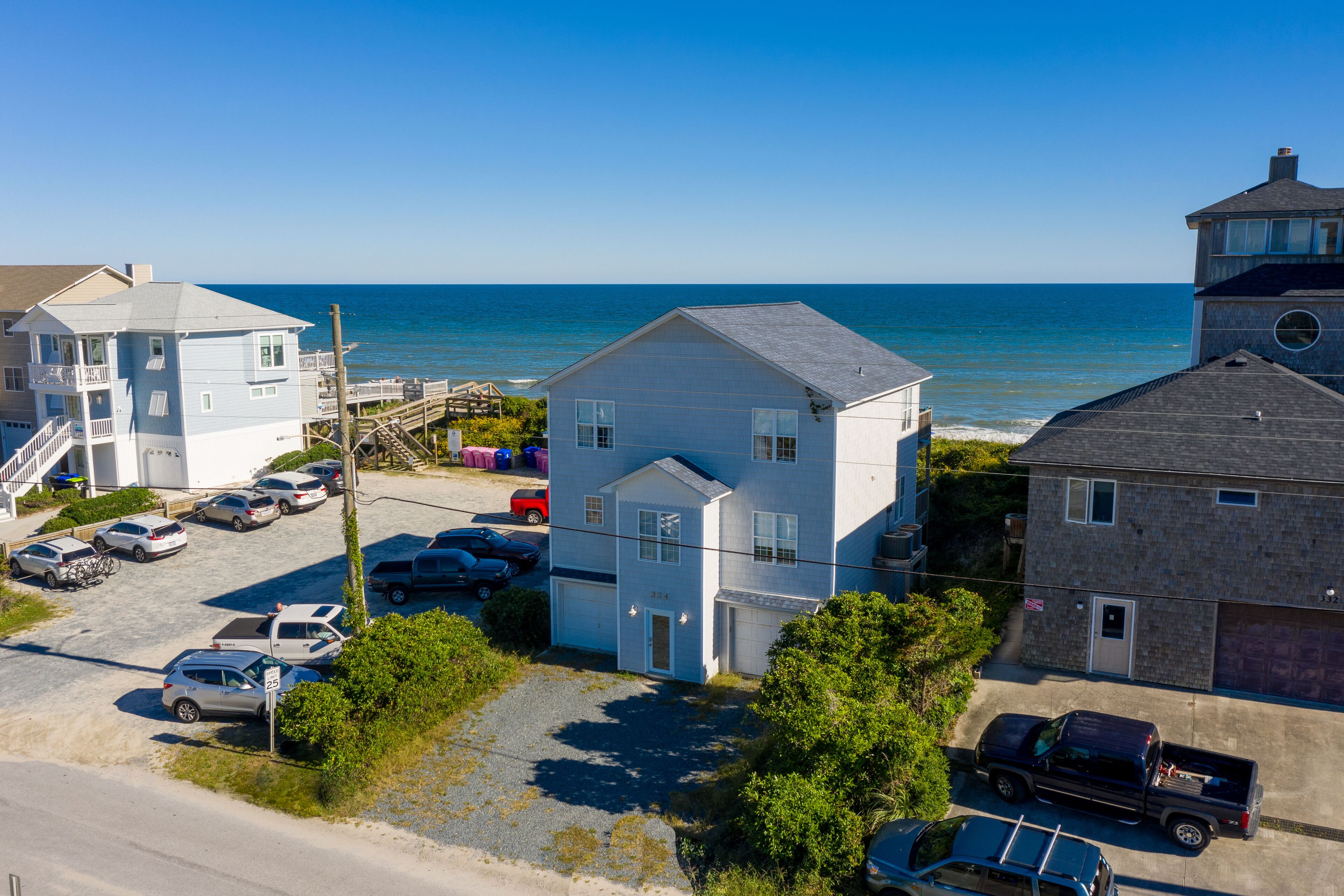 Oceanfront home with beach access, washer/dryer, central AC & golf nearby