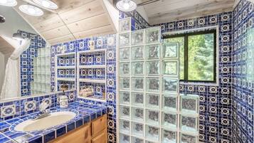 Combined shower/tub, hair dryer, towels, soap