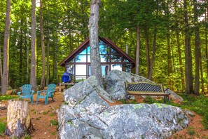 Property grounds - Chalet-style lakefront home with private dock, beach, kayak, canoe & epic view (Meredith)