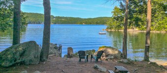 Chalet-style lakefront home with private dock, beach, kayak, canoe & epic view