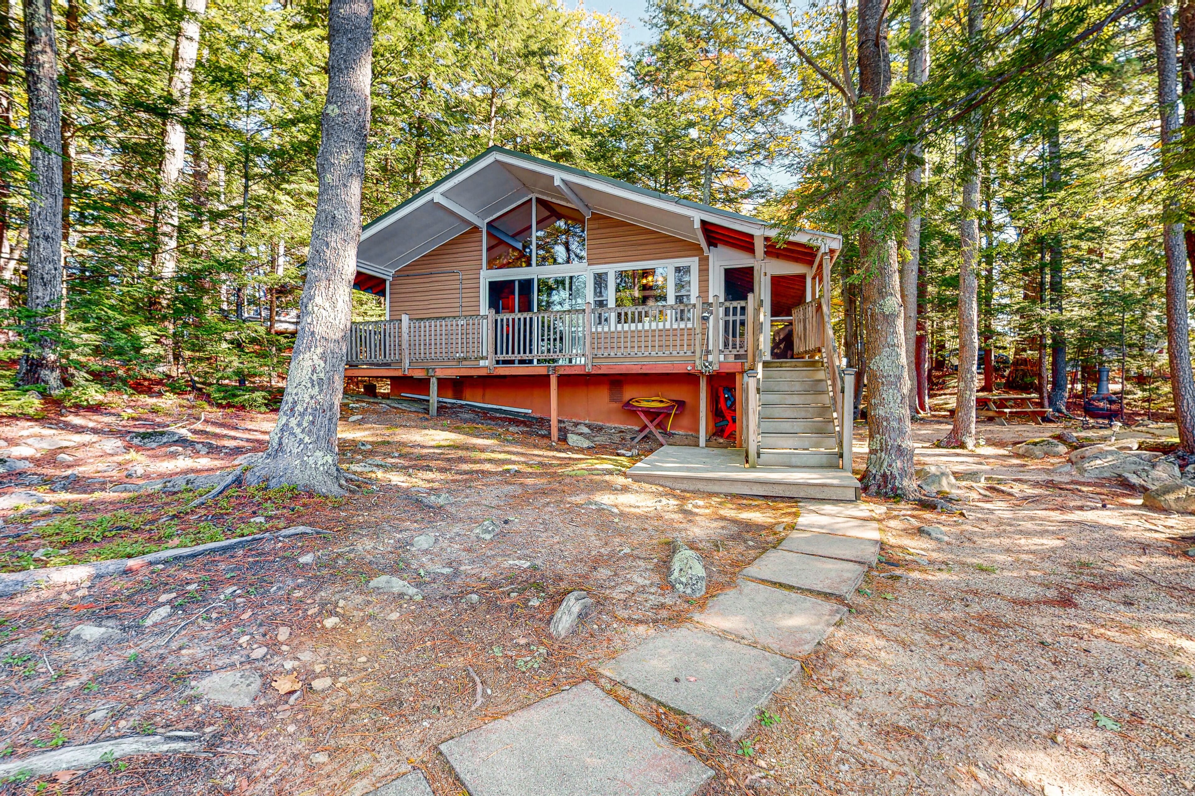 Dog-friendly lakefront cottage with private beach and dock, lake views, and W/D