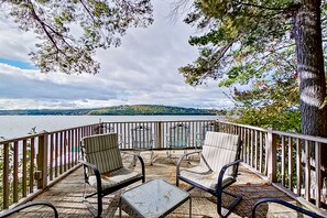 Terrace/patio - Dog-friendly lakefront cottage with private dock, air hockey, water access, W/D (Meredith)