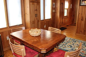 Dining - Waterfront cabin near Fish Cove with private dock, water access, firepit, grill (Meredith)