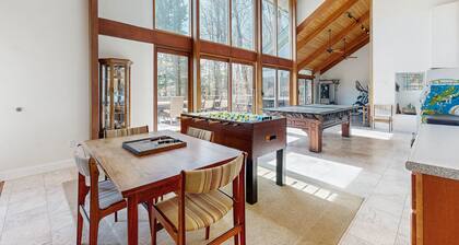 Lakefront home with gym, game room, home theatre, & private beach with boathouse