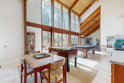 Lakefront home with gym, game room, home theatre, & private beach with boathouse