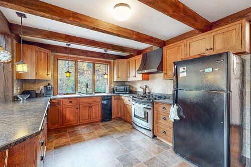 Lovely dog-friendly home with firepit, EV outlet, & washer/dryer