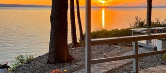 Renovated home with a water view, washer/dryer, full AC, deck & wood stove