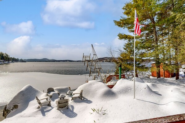 Property grounds - Captivating lakefront home with private dock, row boat, firepit, and lake views (Meredith)