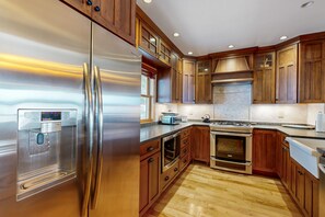 Fridge, microwave, oven, stovetop - Captivating lakefront home with private dock, row boat, firepit, and lake views (Meredith)