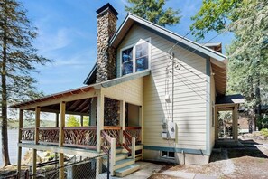 Exterior - Captivating lakefront home with private dock, row boat, firepit, and lake views (Meredith)