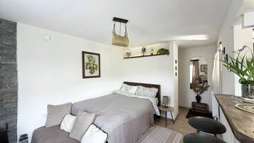 1 slaapkamer, een strijkplank/strijkijzer, wifi, beddengoed