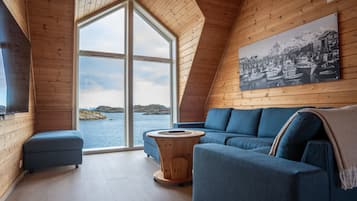 Superior Rorbu-suite med havutsikt | Oppholdsområde