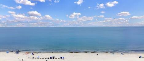 On the beach, sun loungers