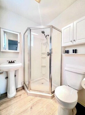 Shower, towels, soap, shampoo