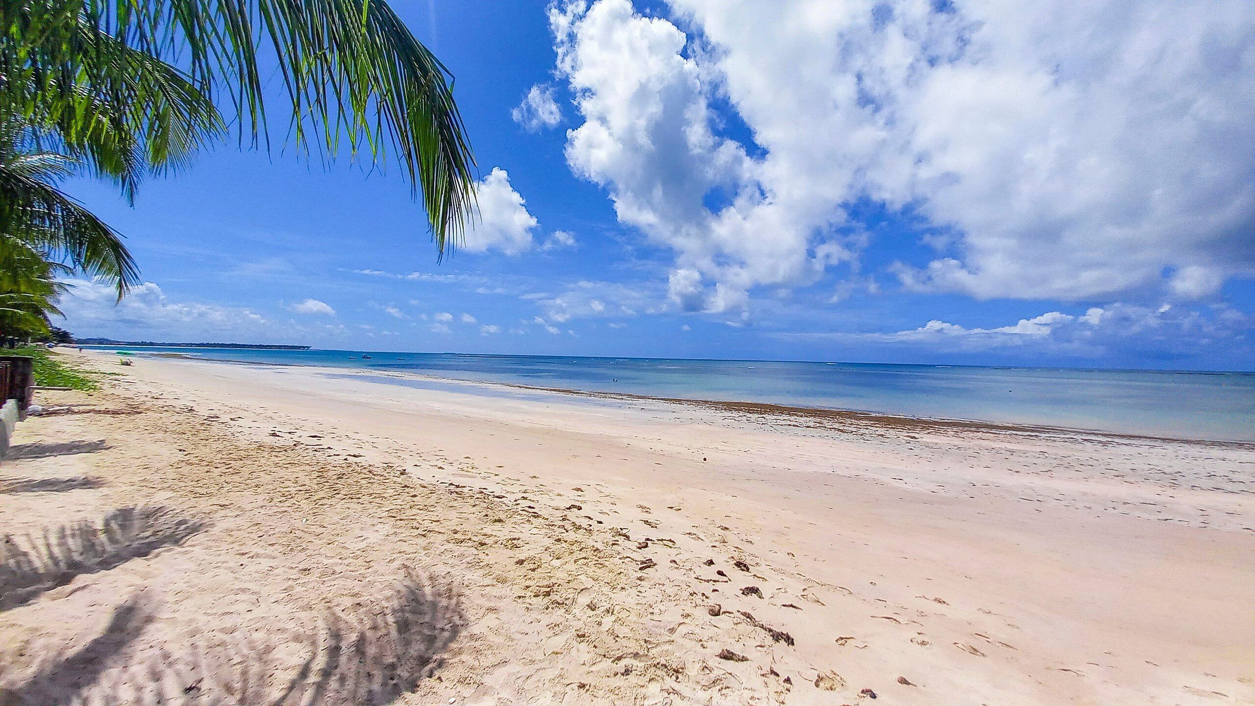 On the beach, white sand