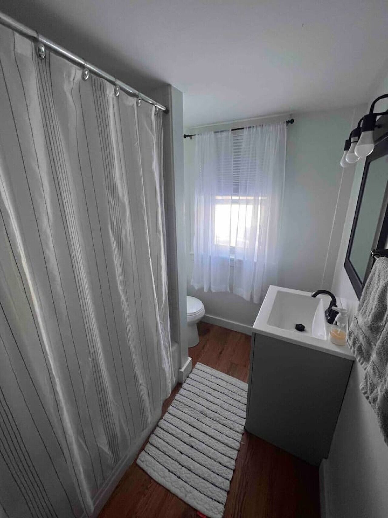 Combined shower/tub, hair dryer