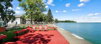 Restored historic log cabin and deck on Lake Erie