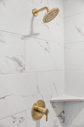 Combined shower/tub, hair dryer, towels, soap