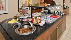 A buffet with various food items and condiments. - 1 Bedroom | Indoor Pool + Hot Tub Access (Albuquerque)